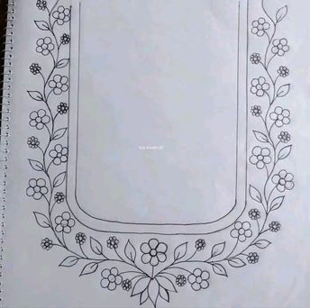 an open notebook with flowers and leaves on the cover, which is drawn in black ink