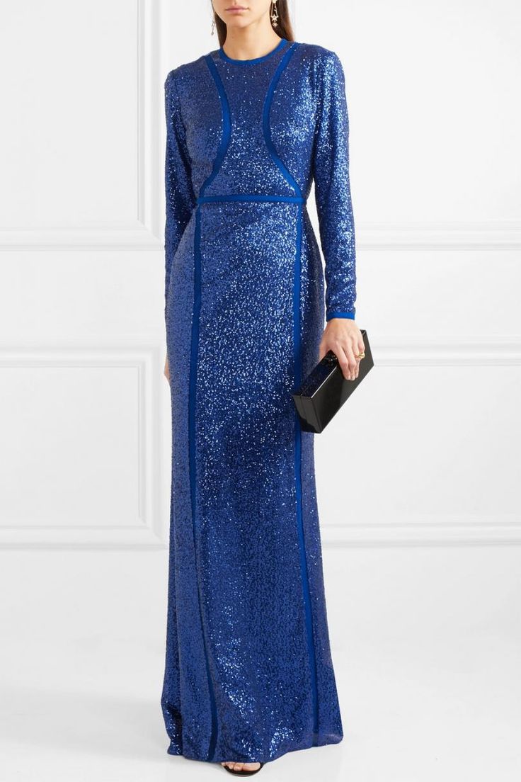 Inspired by oceanic hues and shimmering water, Elie Saab's gown is saturated with 'Pacific Blue' sequins that beautifully catch the light. This silk-blend piece is cut for a close, figure-hugging fit and spliced with tulle panels that are cleverly placed to slim your frame. Wear it to galas, awards ceremonies and formal events with an updo and simple black or metallic accessories. Princess Marie wore the gown in a sleeveless version. This floor length gown clings close to the body. It is crafted Shimmering Water, Elie Saab Gowns, Oscar Gowns, Gown Blue, Edie Parker, Tulle Gown, Floor Length Gown, Pacific Blue, Designer Gowns