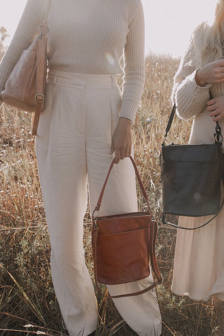 Dare to remember days spent picnic-side with your best friend when you explore the Newport Tote. This bag reminds us that some of life’s richest moments are bathed in simplicity. Intentionally designed to tote your favorite wine and spread, the Newport has a refined silhouette with a down-to-earth, full-grain leather exterior. Pack her away for a day in the sand or take a stroll near your favorite bistro, this bag is perfect for any day or weekend activity on the go. Featuring an adjustable cros Remember Day, Weekend Activities, Mahogany Color, Down To Earth, The Sand, Vegetable Tanned Leather, High Quality Leather, Full Grain Leather, Newport