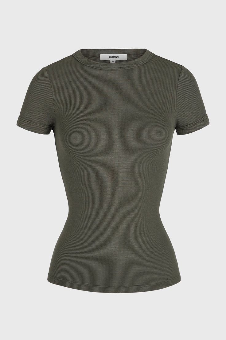 Fitted tee with a crew neckline. Feel a subtle pop of texture in this tight-knit ribbed fabric. It's stretchy, comfortable and forms perfectly to your body. Color: Mineral Rib Sizing: X/S (0-2), S/M (4-6), M/L (8-10) Model is 5'8" and is wearing size X/S Fabric: 95% Ribbed Rayon, 5% Spandex Care: Machine Wash Cold With Like Colors.Care: Lay Flat to Dry. JOAH BROWN | MADE IN LOS ANGELES Form Fitting Tops, Joah Brown, Black Friday Promotions, Fitted Tee, Ribbed Fabric, Green Cotton, Workout Tee, Size Clothing, Cotton Blend