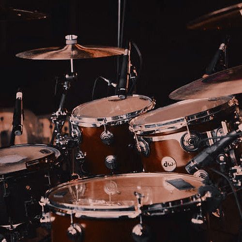 a close up of a drum set on a stage