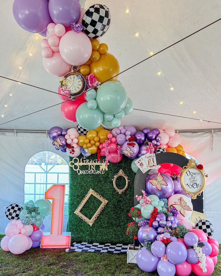 a birthday party with balloons and decorations