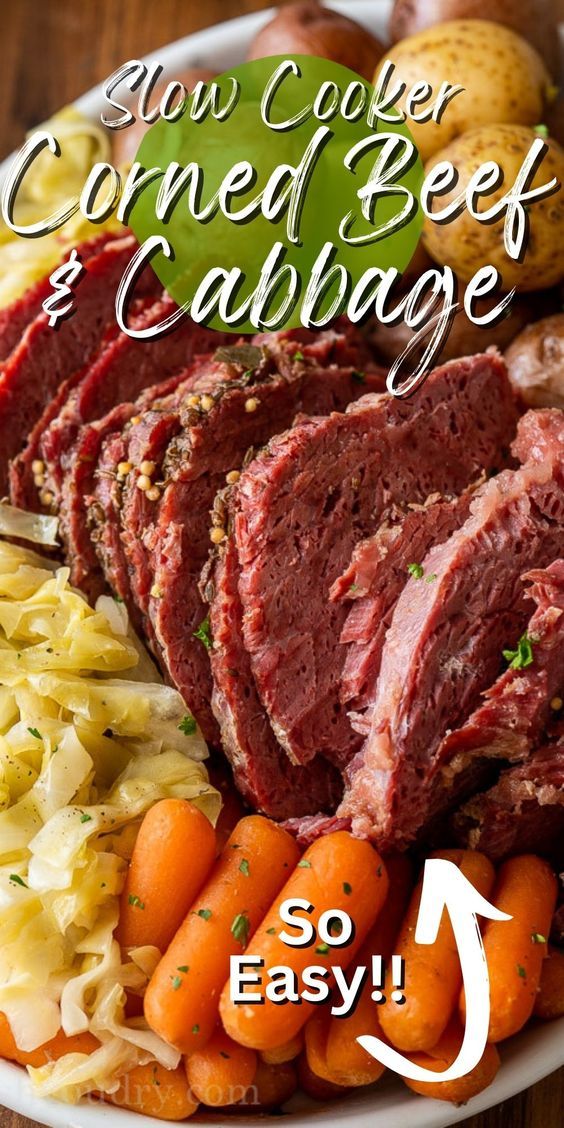 corned beef and cabbage on a plate with carrots