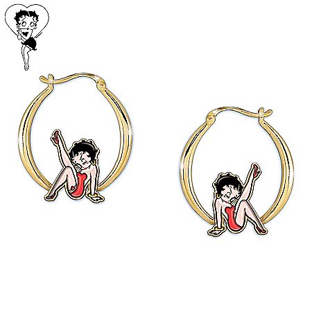 a pair of hoop earrings with an image of a woman sitting on the floor and holding a