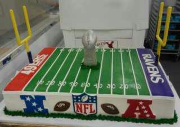 a football field cake is on display in a store