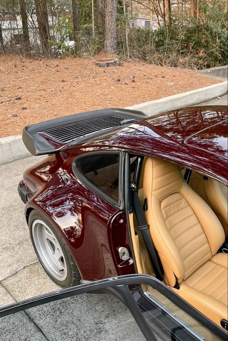 a red sports car parked on the street