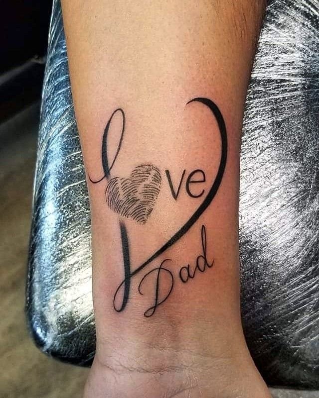 a tattoo with the word love dad written on it