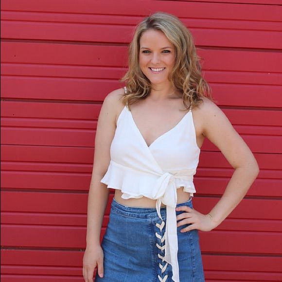 Off White Cropped Spaghetti Strap Top That Wraps And Ties On The Side. Can Knot It Or Tie It In A Bow. Brittney Is 5’5 And Wearing A Small. Small 2/4, Medium 6/8, Large 10/12 White Flirty Camisole For Summer, Flirty White Camisole For Summer, Flirty Spring Camisole Crop Top, Spring V-neck Crop Top With Straps, Spring Flirty Cami Crop Top, Flirty Cami Crop Top For Spring, Flirty Cami Crop Top For Summer, Fitted Summer Camisole With Tie Straps, Flirty Summer Camisole For Day Out