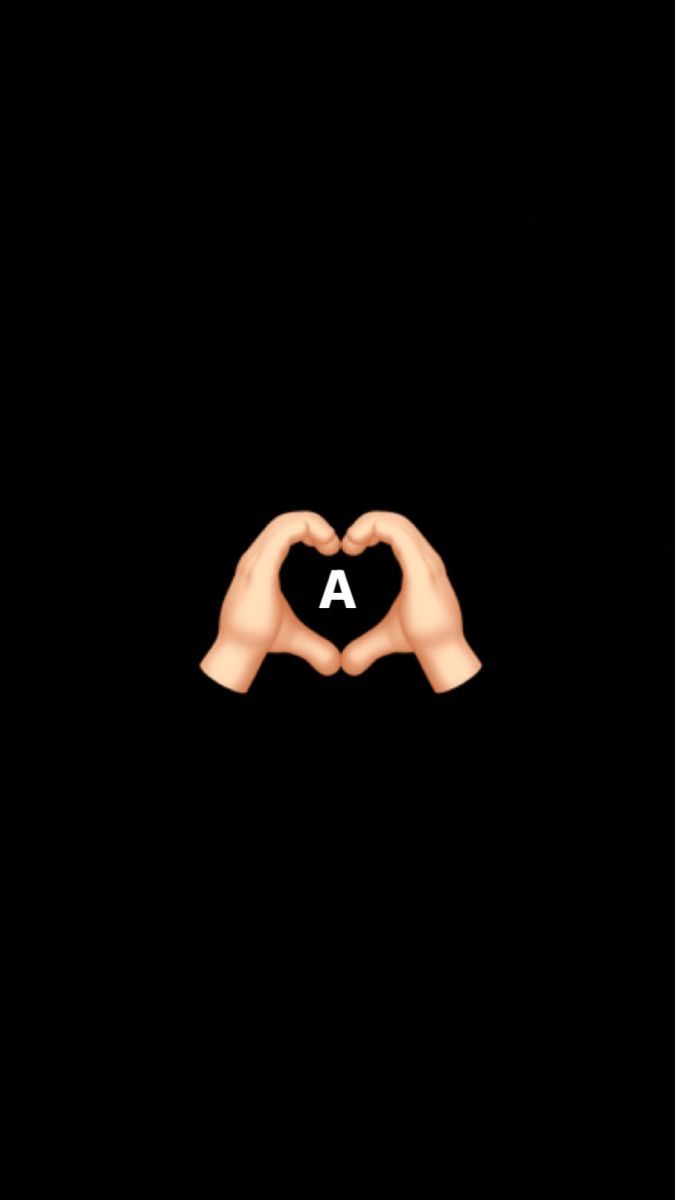 two hands making a heart shape with the letter a in front of them against a black background