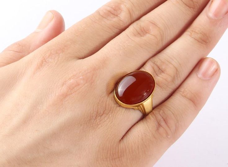 Metal: 14k Yellow Gold Agate: 1.3cm x 1.8cm (0.5" x 0.7") shape - Oval cabochon setting type - Bezel setting Product weight: 5.0 gr A remarkable style that glows with a muted shine! Crafted from 14k yellow gold, this ring features one oval cut red agate cabochon stone set on the top of this elegant design. Your fashion statement will be heard! ----------------------------------------------------------------------AgateAgate derives its name from the Greek "Agate" - happy. According to another the Men Earrings, Red Agate, Men's Necklace, Unique Gemstones, Oval Cabochon, Natural Red, Agate Gemstone, Agate Stone, Stone Settings