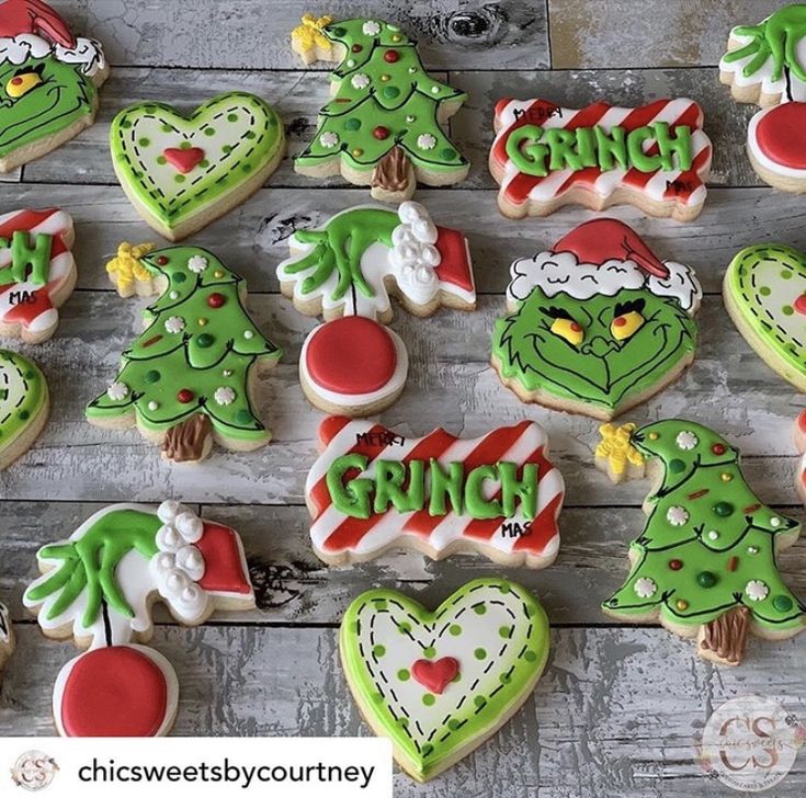 decorated cookies with the word grin on them and christmas trees in different colors, shapes and sizes