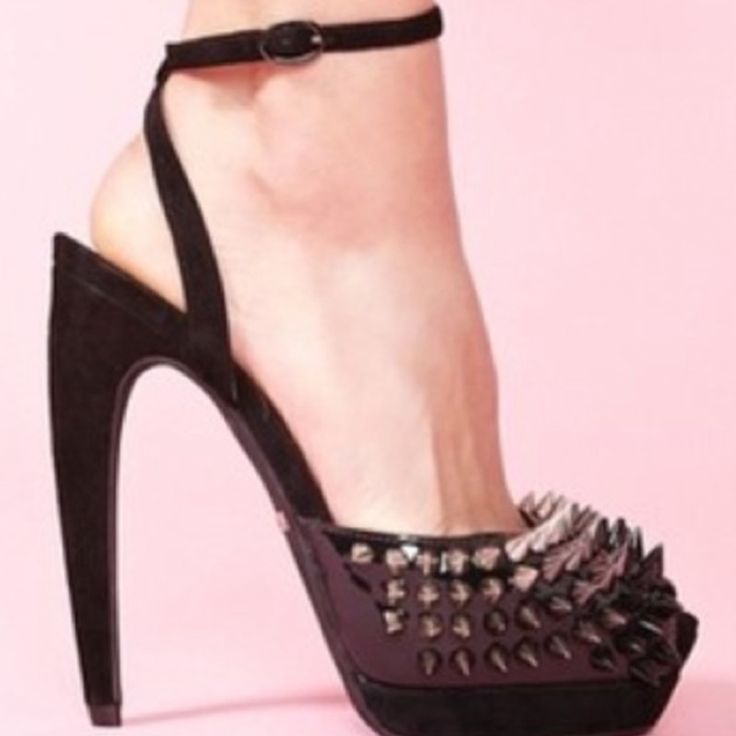 Spiked Sexy Heel Punk Closed Toe Heels For Party, Edgy Heels With Heel Strap For Night Out, Punk Style Platform Heels For Night Out, Edgy Synthetic Heels For Night Out, Black Heels With Metal Feet For Party, Black Punk Heels For Night Out, Studded Heels For Summer Parties, Trendy Closed Toe Heels With Spikes, Trendy Studded Formal Heels