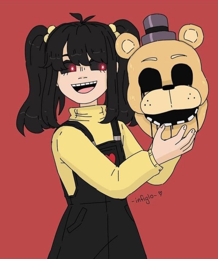 a woman holding a stuffed animal in front of her face and wearing a bear mask