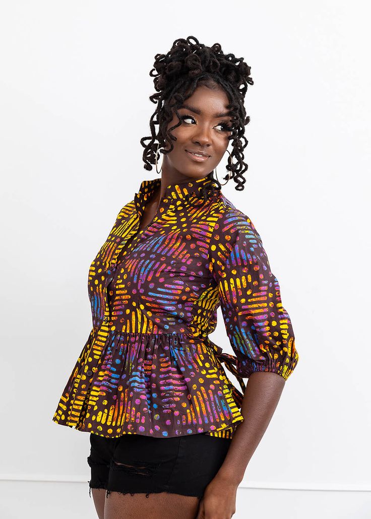 Show off your bold and beautiful side with the Aega Women's African Print Peplum Blouse! Featuring a stunning African inspired Adire print with a flattering peplum silhouette, this blouse is sure to turn heads. Pair it with a great pair of jeans and your all set! Shop matching items here. Ankara Suit, Dress Pro, Red Tiles, Cultural Appropriation, Tiny Bird, African Inspired Fashion, Tile Print, African Diaspora, Ankara Fabric