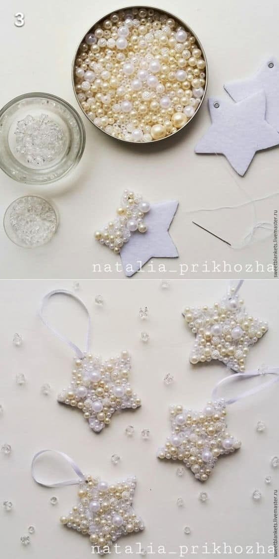 some ornaments are being made out of pearls and other things to make them look like snowflakes