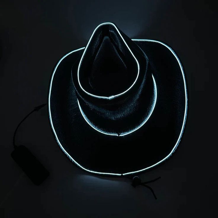 EL WIRE Light Up Iridescent Space Cowboy Hats comes in sparkly black color The EL wire lights are attached to the hat which illuminate with the help of batteries on pushing the button after pulling the tab These trendy, crazy, funny, sparkly & cute cowboy hats illuminates in 3 different EL wire light modes - flash, blink and steady which makes it perfect to wear in the dark These unisex cowboy / cowgirl hats can be worn by women, girls, boys, men & kids for night event, birthday, wedding, dance Black Cowboy Hat, Space Cowboy, El Wire, Black Cowboy, Space Cowboys, Wire Lights, Glow Party, Crazy Funny, Cowboy Cowgirl