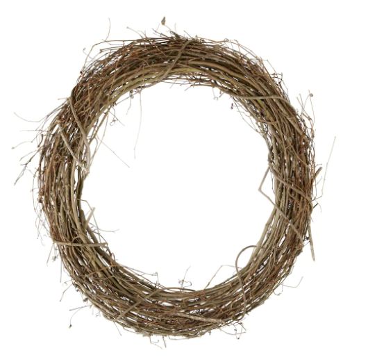 a close up of a wreath made out of twigs on a white background with clippings