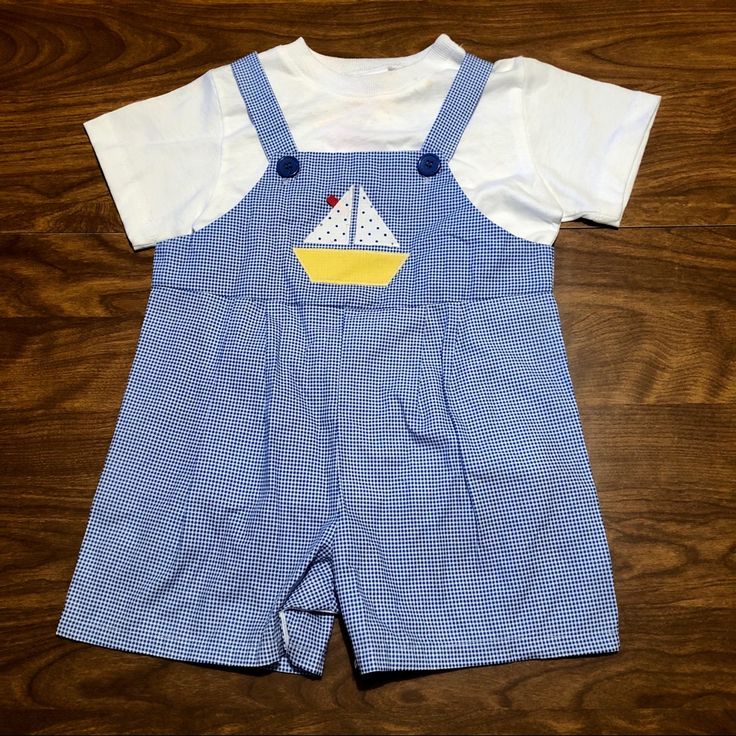 White Short Sleeved T-Shirt With Adorable Blue And White Bib Shorts. The White Shirt Has A Small Stain Near The Collar But I Believe It Would Come Out When Washed. Cute Blue School Sets, Playful Blue School Sets, Light Blue Casual Sets For Playtime, Casual Light Blue Sets For Playtime, Light Blue Casual Playtime Sets, Casual Light Blue Playtime Set, Cotton Navy Sets For Playtime, Navy Cotton Playtime Sets, Navy Tops For Playwear In Summer