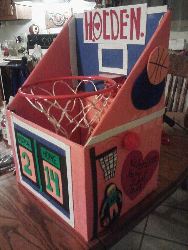 a cardboard box that is shaped like a basketball hoop