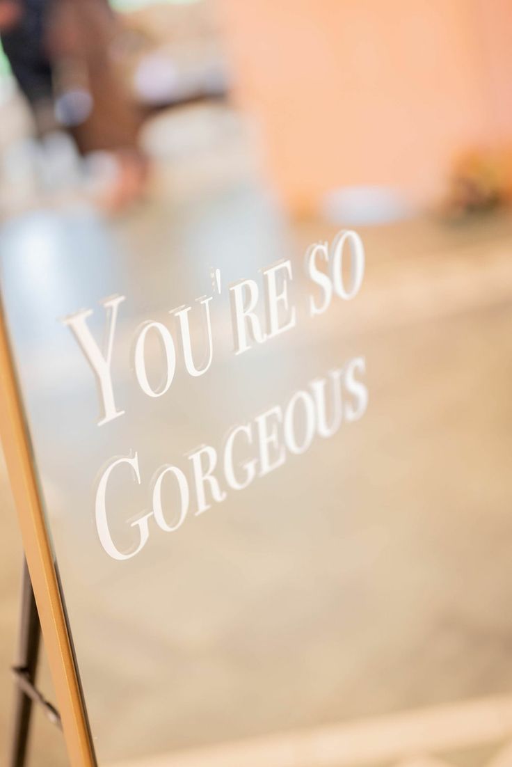 there is a sign that says you're so gorgeous