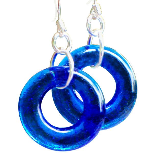 two blue rings are hanging from silver hooks