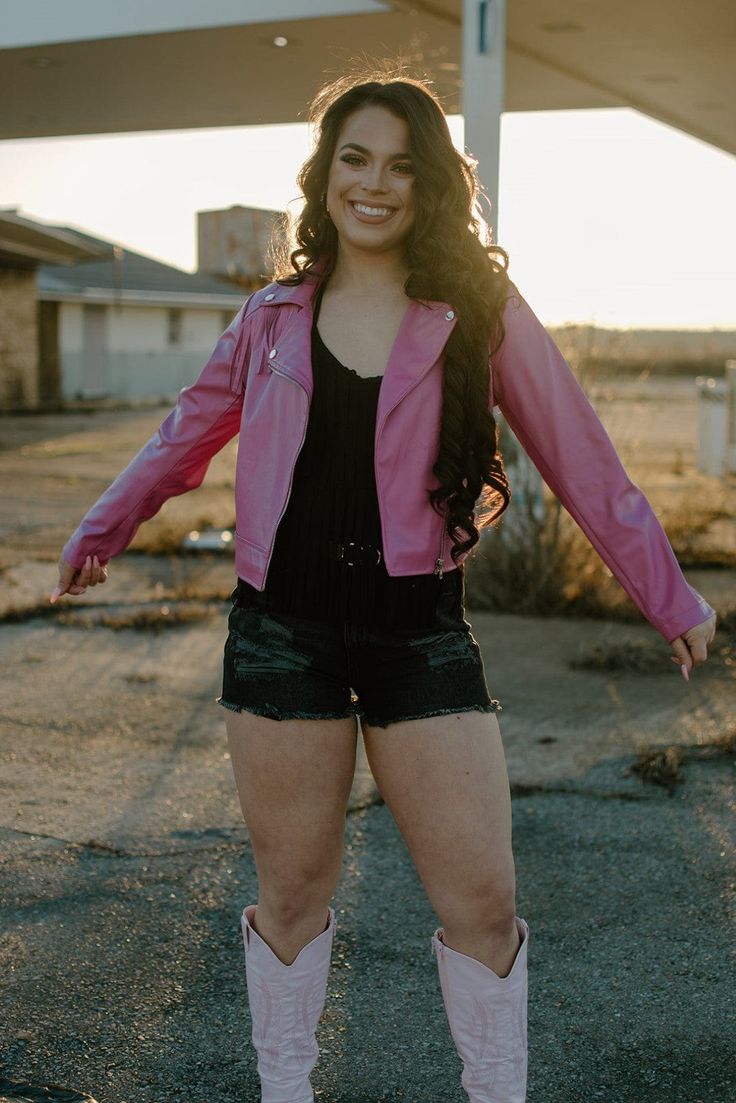 Hot Pink Fringe Vegan Leather Jacket indulge your need for the trending moto style jacket - and we have this one in black and white too! faux suede fringe at the front and back yoke give a touch of western detailing the asymmetric zipper closure mimics the zippered slash pockets runs true to size with a bit of stretch the small fits like a 0-4, medium like a 6-8, large fits like a 10/12 kind of cropped at 19" from the shoulder to the straight hem model, Tori is wearing a size medium Pink Leather Jacket Outfit, Pink Leather Jacket, Fringe Leather Jacket, Vegan Leather Jacket, Moto Style, Suede Fringe, Medium Dress, Leather Jacket Outfits, Small Dress