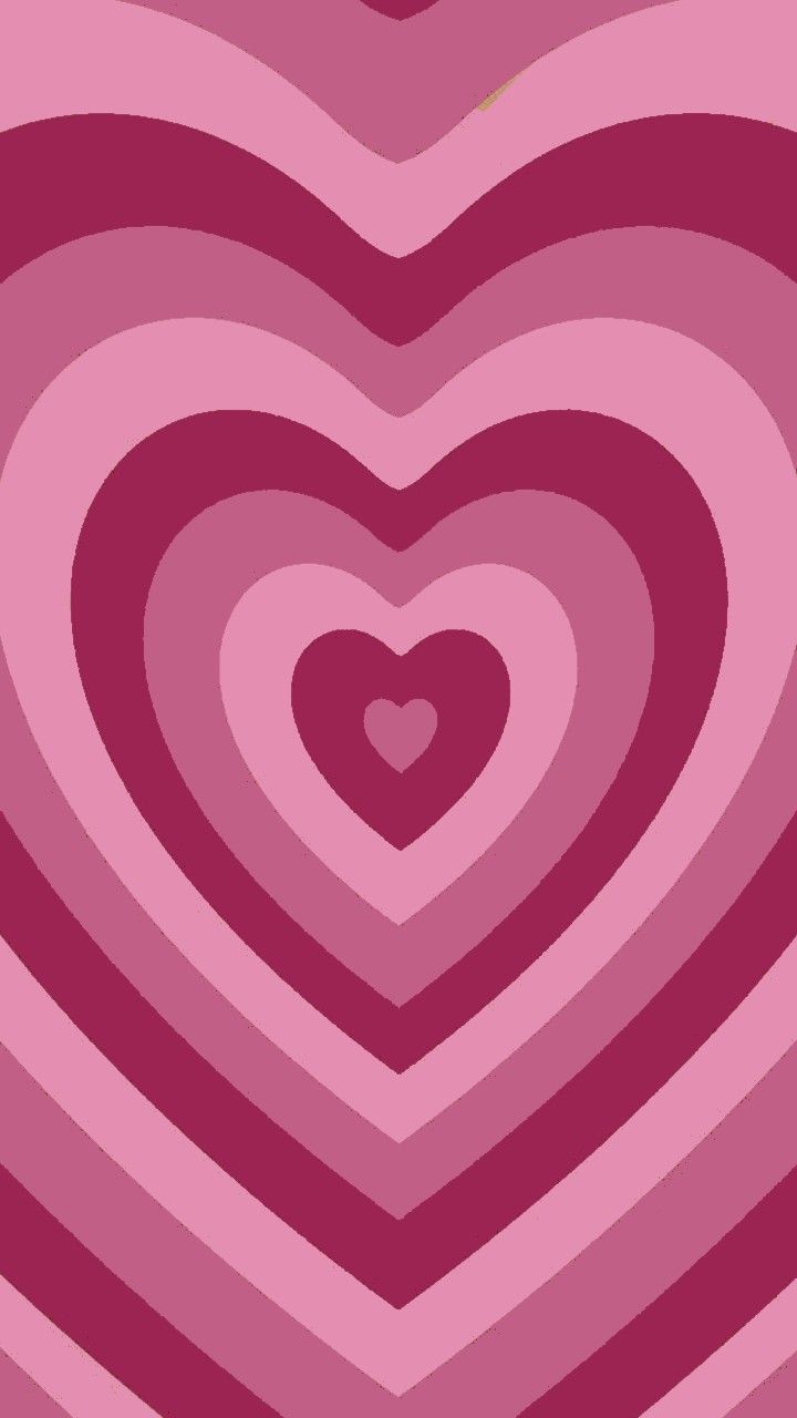 a heart shaped pattern in shades of pink and purple