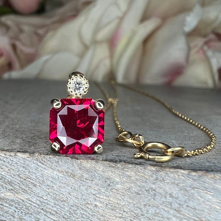 Wow picks! Ruby pendant necklace 14k yellow gold, Radiant cut ruby and diamond necklace pendant, July birthstone jewelry, Dainty Stacking Necklace 7761 at $316.0 Choose your wows. 🐕 #DaintyNecklace #14kYellowGold #RubyNecklace #RubyAndDiamond #JulyBirthstone #RadiantCut #BirthstoneJewelry #RubyPendant #StackingNecklace #NecklacePendant Cushion Cut Ruby Jewelry Gift, Cushion Cut Ruby Jewelry For Gift, Cushion Cut Ruby Jewelry As Gift, Yellow Gold Cushion Cut Necklace As A Gift, Cushion Cut Yellow Gold Necklace Gift, Red Diamond Radiant Cut Jewelry, Fine Jewelry Ruby With Radiant Cut, Red Radiant Cut Diamond Jewelry, Fine Jewelry Ruby Diamond Necklace In Red