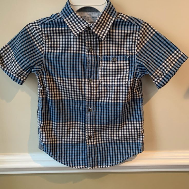 Super Cute Button Down Dress Shirt By Calvin Klein! It’s A Size 5 And In Excellent Condition. Never Worn But Has No Tags. Shirt With Button Closure For School In Spring, Classic Calvin Klein Shirt For Summer, Spring Button-up Shirt For School, Blue Shirt For School In Summer, Blue School Shirt For Summer, Calvin Klein Short Sleeve Shirt For Spring, Button-up Shirt With Buttons For School, Summer School Shirt With Buttons, Blue Summer School Shirt