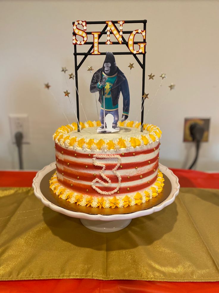 there is a cake on the table with an image of a gorilla