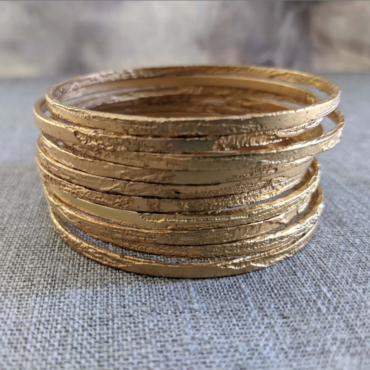 "Yall, I've finally made a thinner etched bangle The bangle is really special because unlike a lot of things we make over here, the etched pattern on each bangle is one of a kind! Meaning I acid etch each bangle so it they have their own unique texture!! The Alice bangle is named after my maternal grandmother, an amazing woman who I am named after, who left this earth soon after I was born. From what I know, she had amazing style, a very green thumb and was an amazing cook. There are three sizes Modernist Silver Jewelry, Single Bangle, Metal Etching, Amazing Woman, The Bangles, Brass Bangle, Small Bracelets, Gold Plated Bangles, Gold Rings Fashion