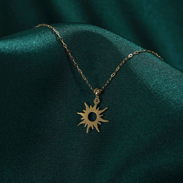 "SUN NECKLACE ❤️ ITEM DETAILS * Material: Sun Necklace is 14K Solid GOLD (not filled or plated). * Gold Necklace Chain Length: 16,7\" inch (42,5cm) Main Chain and 1\" inch (2,5cm) Adjustable Chain Part Total: 17,7\" inch (45cm) * Chain Width: 0,65mm * Finish: 14K Yellow Gold * Stone: Zircon * Featuring: 13mm x 13mm Sun ♥ SHIPPING We work with Dhl Express for worldwide shipping. Please leave your phone number at checkout for delivery purposes. Production time: 3-5 business days. ❤️ You May Also b Sun And Moon Design Sunburst Jewelry Gift, Sun And Moon Design Necklace As A Gift, 14k Gold Sun Design Jewelry Gift, 14k Yellow Gold Sun Design Necklace, Gold Celestial Sunburst Jewelry, Celestial Gold Sunburst Jewelry, Starburst Jewelry With Sun Design As A Gift, Gold Sunburst Jewelry For Gift, 14k Gold Starburst Jewelry For Gift