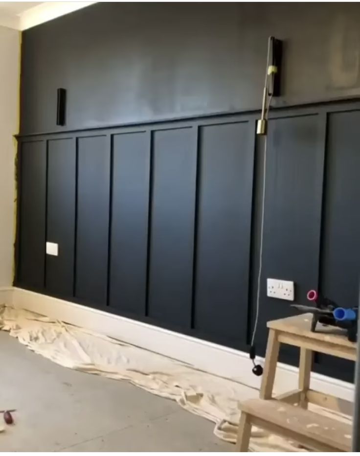 a room that has been painted with black paint