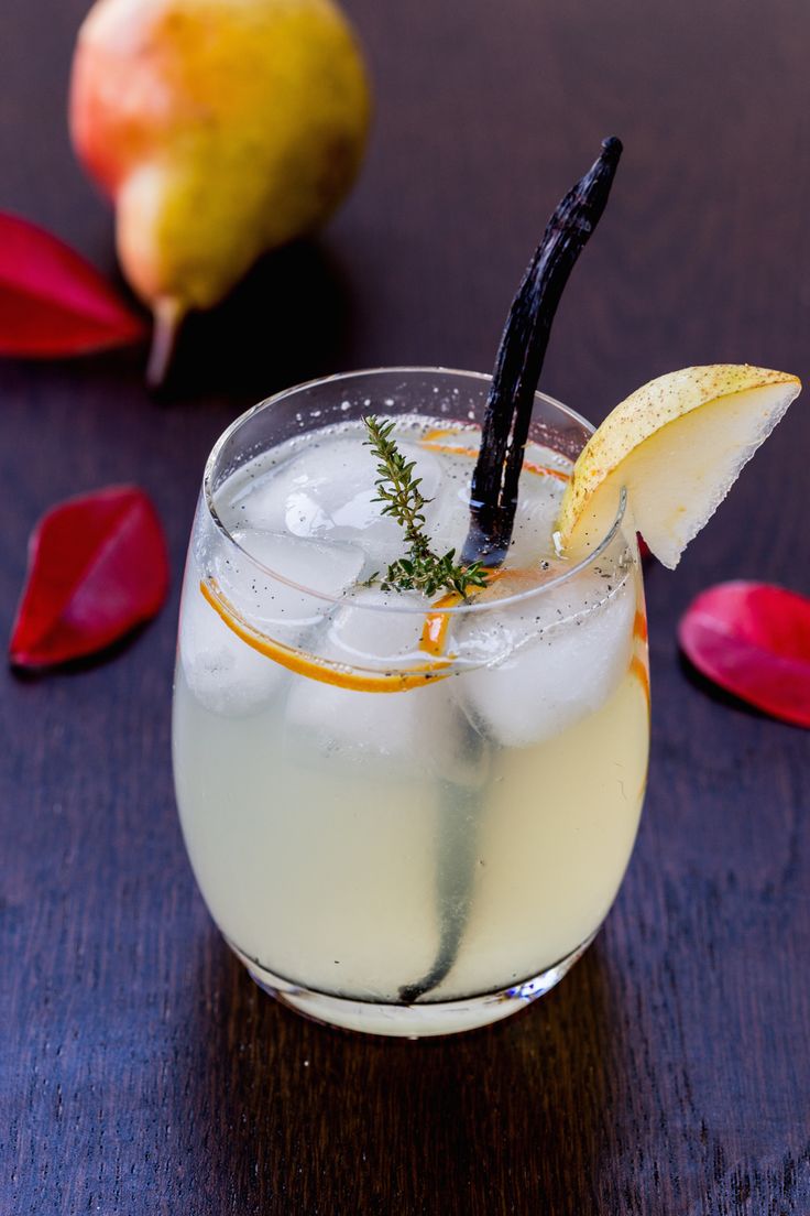 a drink with an orange slice on the rim