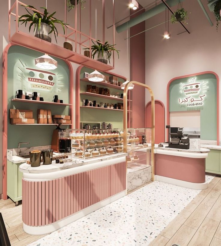 the interior of a cosmetics store with pink and green walls, potted plants and shelves