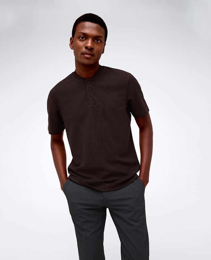 WHAT’S IN IT FOR YOU? Ribbed bomber collar Three-button closure Breathable, lightweight fabric for added comfort on your skin 4-way stretch properties for extra flexibility Features moisture-wicking properties to keep you cool and dry Short sleeves 67% polyester, 33% rayon Machine wash, tumble dry Imported | Kenneth Cole | Performance Band-Collar Henley in DARK BROWN, Size: XL Dark Brown Fabric, Studded Shoes, Cashmere Outfits, Perfect White Tee, Studs Men, Brown Fabric, Band Collar, Short Suit, Short Sleeve Polo