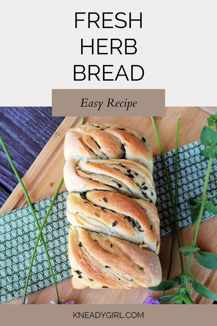 fresh herb bread on a cutting board with flowers and herbs in the background text reads easy recipe