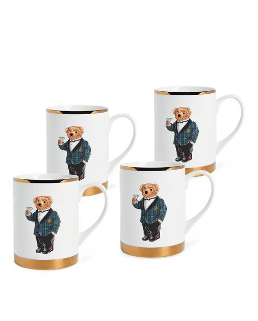 three coffee mugs with the image of a teddy bear wearing a suit and tie