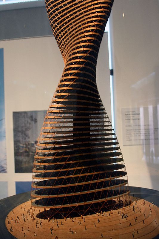 a large wooden sculpture sitting on top of a table