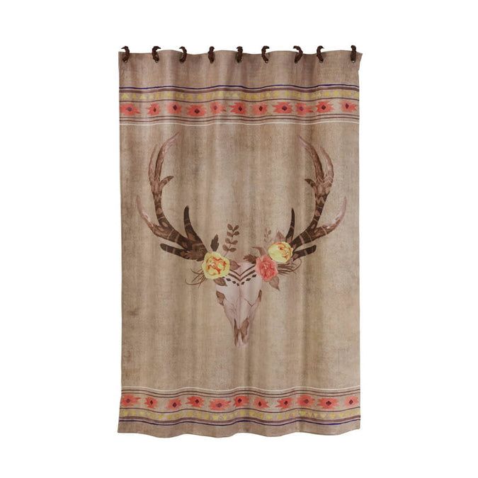 a shower curtain with an elk skull and flowers on it's side, hanging from a metal rod