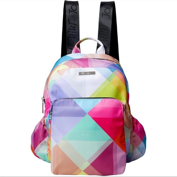 Betsey Johnson Geometric Nylon Backpack Purse Nwt * Offering A Spacious Interior And A Zip-Closure Cosmetic Bag To Hold Small-Size Accessories. Includes Pink And Blue Geometric Backpack And Matching Cosmetic Bag (Two Pieces Total) Backpack: 10.5'' W X 13.5'' H X 4.25'' D 3'' Handle Drop 19'' Strap Drop Outer: Nylon Lining: Polyester Zip Closure Interior (Backpack): One Zip And Two Slip Pockets Exterior (Backpack): Two Side Slip Pockets Imported Trendy Multicolor Softback Backpack, Trendy Pink Nylon Backpack, Multicolor Nylon Backpack For On-the-go, Trendy Multicolor Backpack For Daily Use, Trendy Multicolor Backpack For On-the-go, Convertible Backpack Purse, Vegan Leather Backpack, White Backpack, Floral Backpack