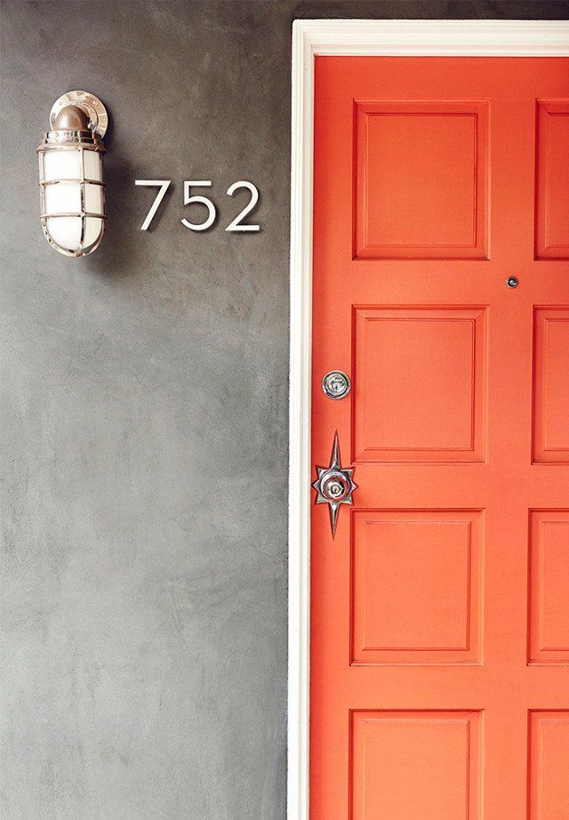 an orange door with the number 752 on it