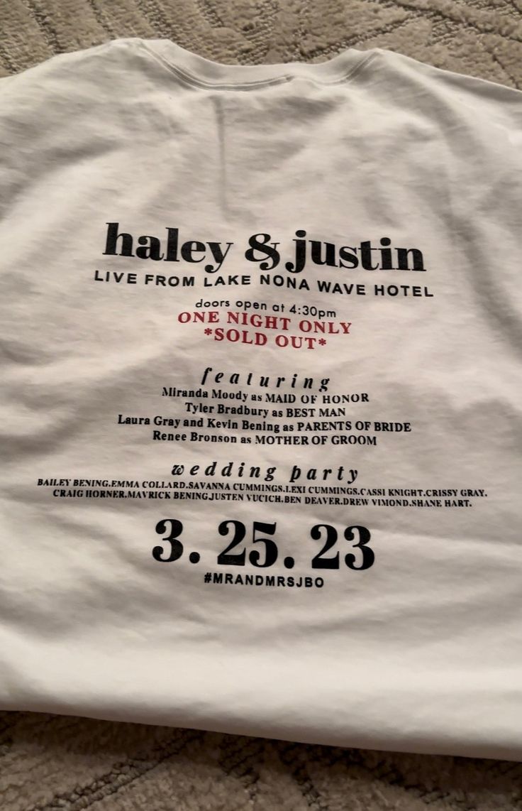 a white t - shirt with the words haley and dustin on it sitting on a bed