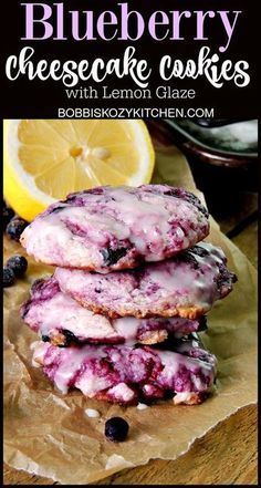 blueberry cheesecake cookies with lemon glaze are stacked on top of each other