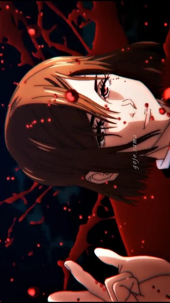 an anime character with long hair and blood on her face