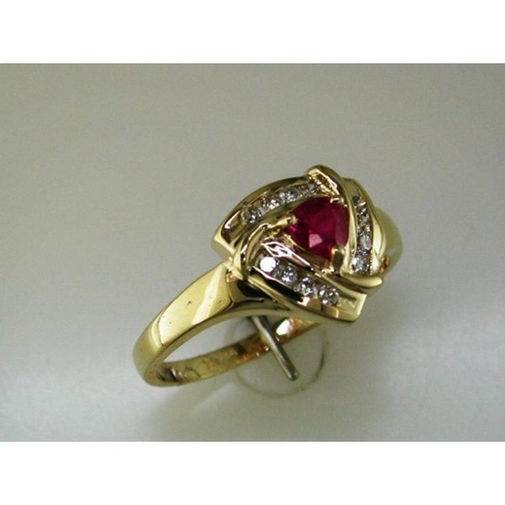 Royal 14K Yellow Gold Ruby & Diamond Ring - Timeless Elegance Elegant Yellow Gold Ruby Ring, Elegant Formal 14k Gold Ruby Ring, Elegant 14k Gold Ruby Ring, Elegant Ruby Ring With 17 Jewels, Elegant Yellow Gold Ruby Ring For Formal Occasions, Elegant Ruby Ring For Anniversary, Elegant Ruby Ring With Center Stone For Promise, Elegant Yellow Gold Ruby Promise Ring, Elegant Ruby Rings In Yellow Gold