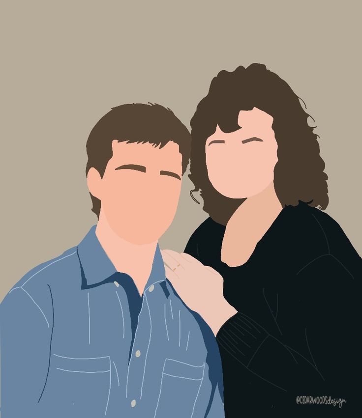 two people standing next to each other in front of a gray background with one person holding the other's hand