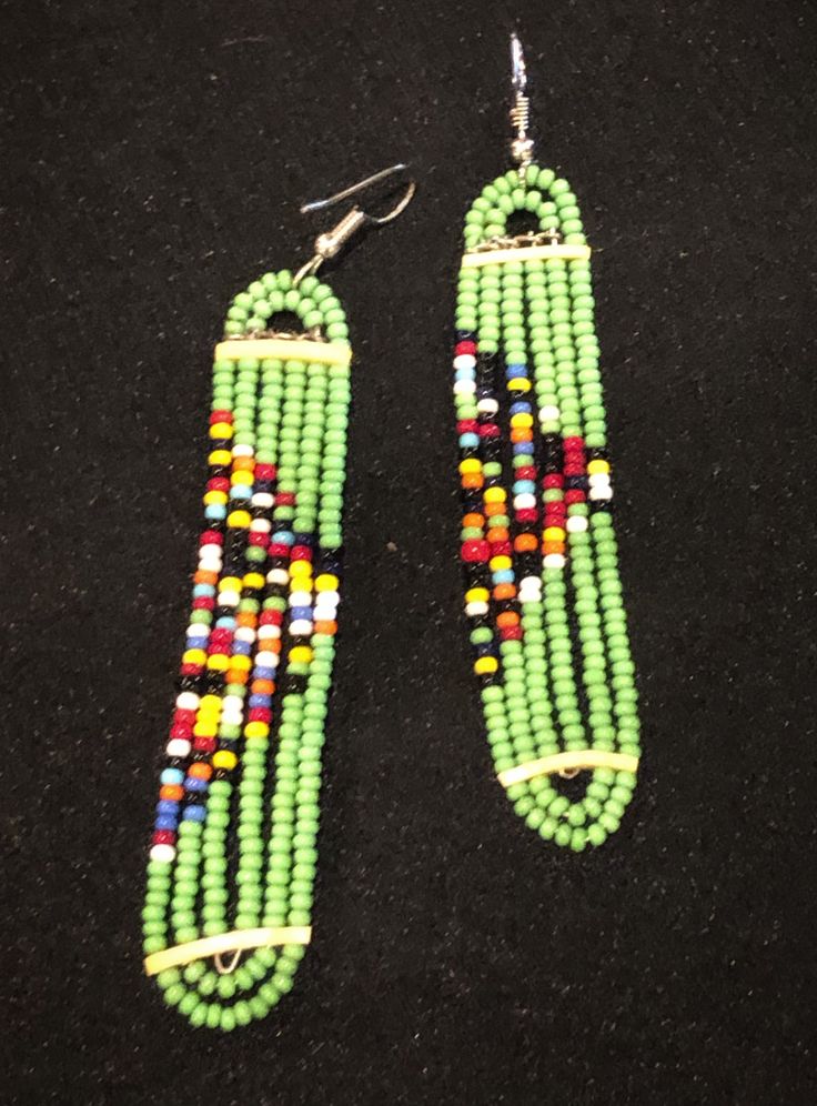 Seed bead pierced earrings with colorful beaded embellishment and multicolor style. Woven Earrings, Seed Bead Bracelet Patterns, Beaded Jewelry Earrings, Beaded Chandelier Earrings, Beaded Earrings Native, Earrings Patterns, Bead Earring, Vintage Earring, Beaded Necklace Patterns