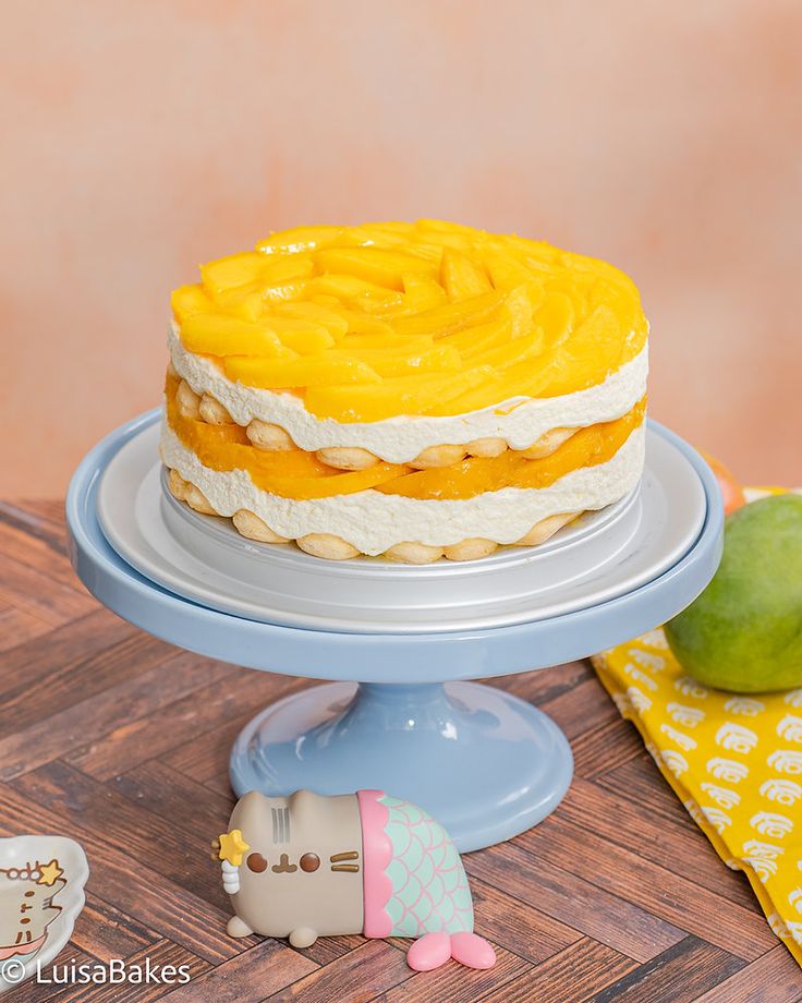 there is a cake that has been decorated with yellow icing