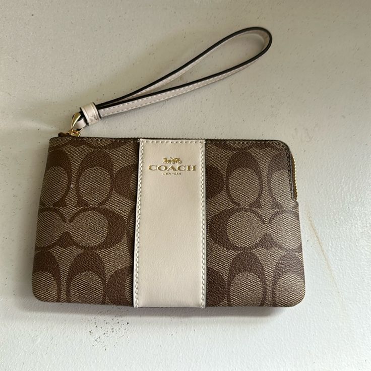 New With Tags, Roughly 6 In X 4 Inches Coach Clutch With Zipper For Daily Use, Coach Beige Wristlet With Removable Pouch, Coach Rectangular Clutch, Coach Pouch Wristlet For Everyday Use, Coach Wristlet Pouch For Daily Use, Coach Rectangular Clutch For Daily Use, Daily Use Coach Wristlet Pouch, Daily Use Coach Pouch Wristlet, Beige Wallet With Zipper Pouch For Daily Use